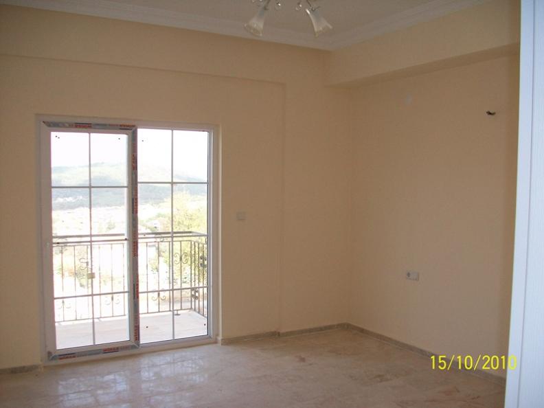 Property Type : Duplex Apartment Floor : 2 (first floor + attic floor)
Num. of Bedrooms : 2
Num. of Baathrooms+WC : 2
Interior Area : 80m²
Terrace & Balconies : 6m²
Swimming Pool : Communal swimming pool - 55m²
Children’s Swimming Pool : Yes
Car Parking Area : Communal car parking area
Nearest Airport & Distance : Dalaman International Airport, 45minutes drive away
Nearest Beach & Distance : Ölüdeniz Beach, 5 minutes drive away